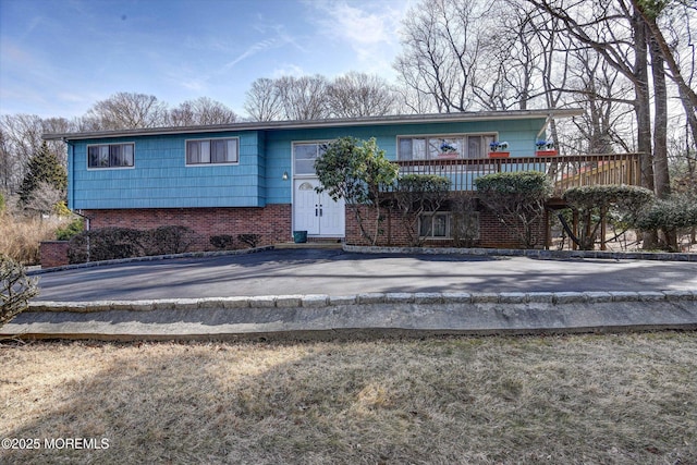 raised ranch with brick siding