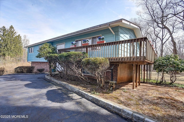 view of front of house featuring a deck