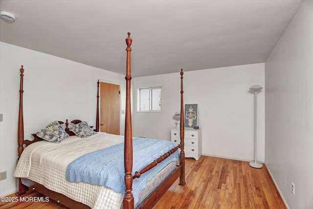 bedroom featuring light wood-style floors