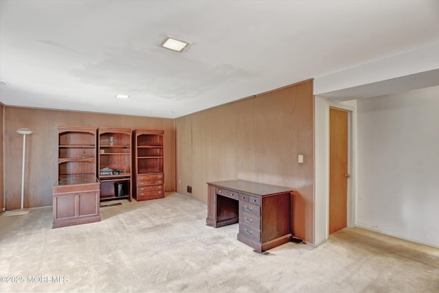 unfurnished office featuring light colored carpet