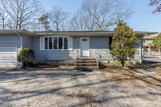 single story home with an attached garage