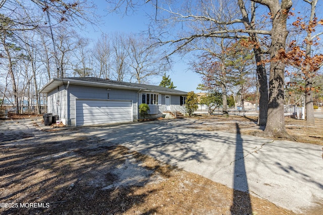 view of front of property with an attached garage and driveway