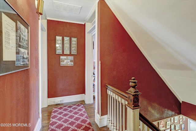 interior space featuring visible vents, baseboards, and wood finished floors