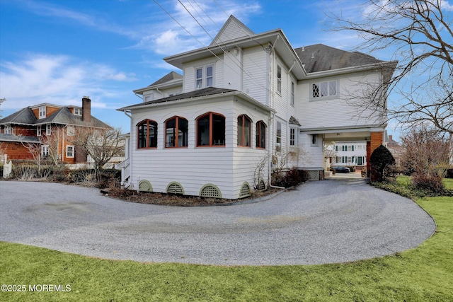 view of front of house featuring a garage and driveway