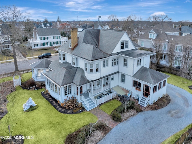 drone / aerial view with a residential view