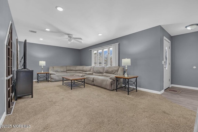 living area with visible vents, baseboards, ceiling fan, and recessed lighting