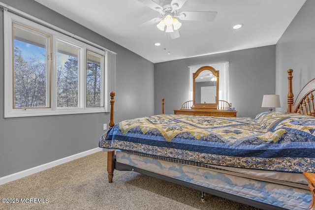 carpeted bedroom featuring ceiling fan, baseboards, and recessed lighting