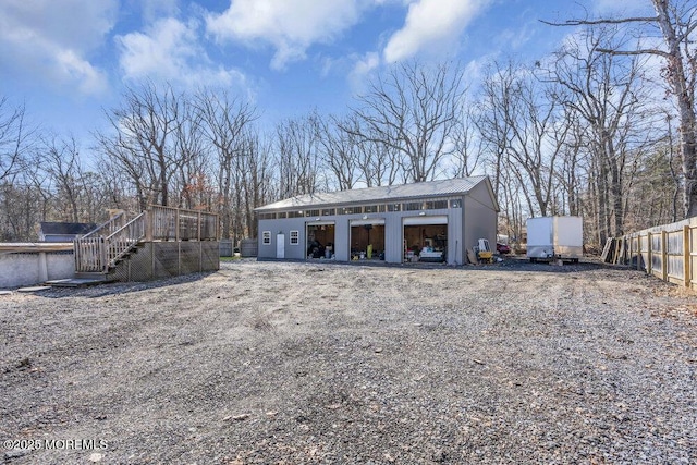 detached garage with fence