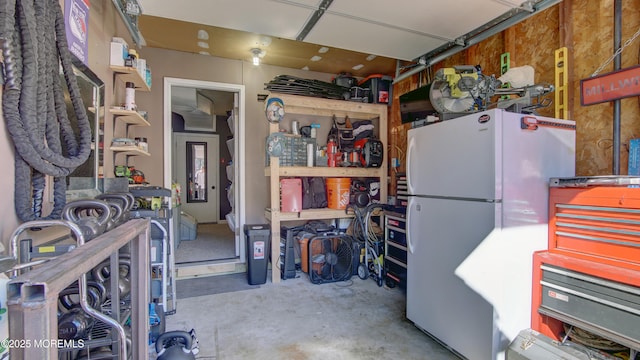 garage featuring freestanding refrigerator