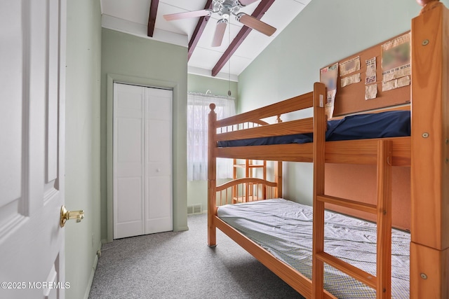 bedroom with lofted ceiling with beams, carpet, visible vents, and a ceiling fan