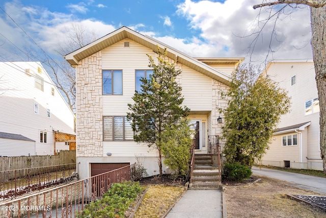 traditional home featuring fence