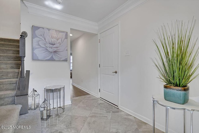 interior space featuring stairs, marble finish floor, baseboards, and crown molding