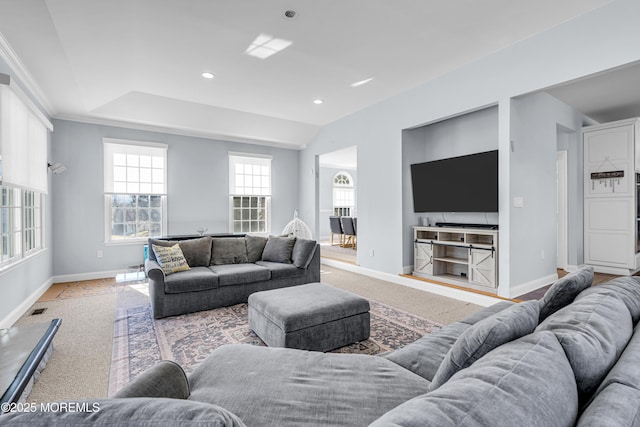 living room with recessed lighting, visible vents, and baseboards