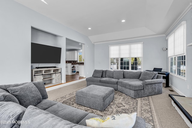 living room featuring recessed lighting and baseboards