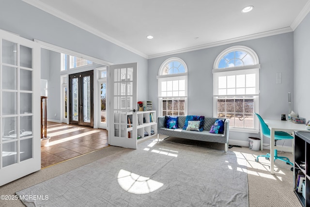 interior space featuring baseboards, french doors, recessed lighting, and crown molding