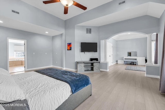 bedroom with light wood-type flooring, baseboards, and visible vents