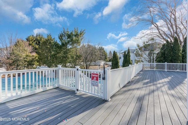 deck with a swimming pool