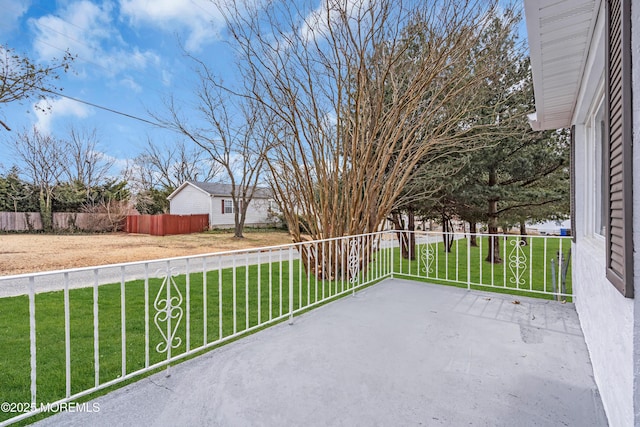 view of patio featuring fence