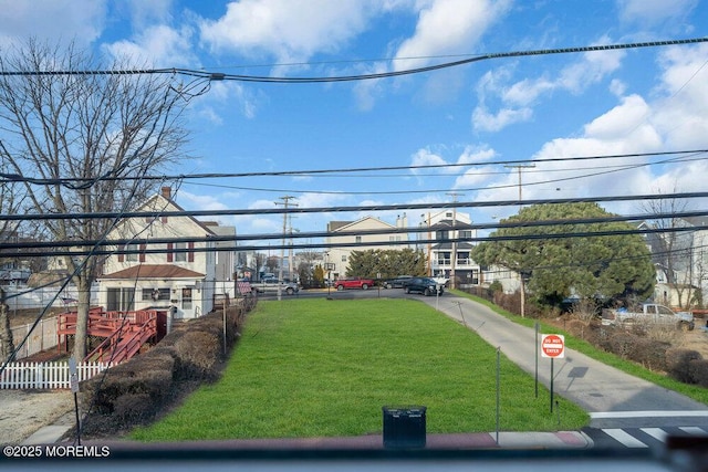 view of yard featuring fence