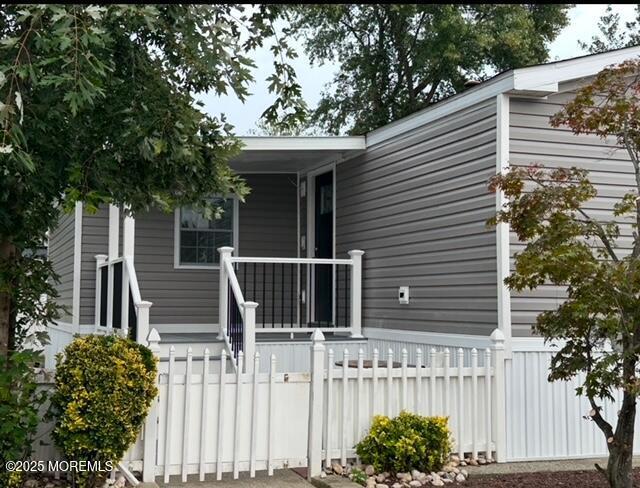 view of front of home with fence