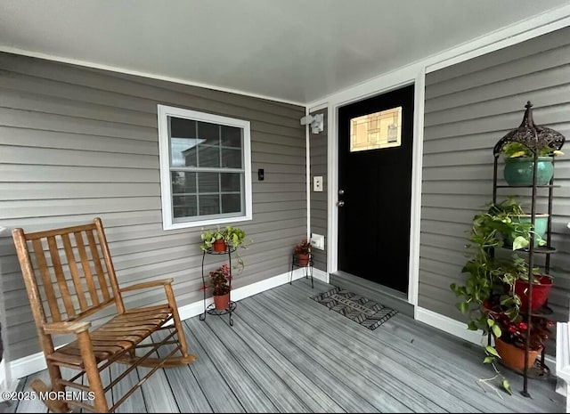 doorway to property with covered porch