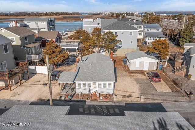 birds eye view of property with a residential view