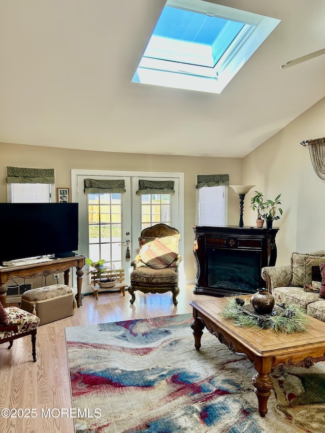 2 Apache Dr, Toms River, NJ 08753 - living area featuring french doors, a skylight, and wood finished floors
