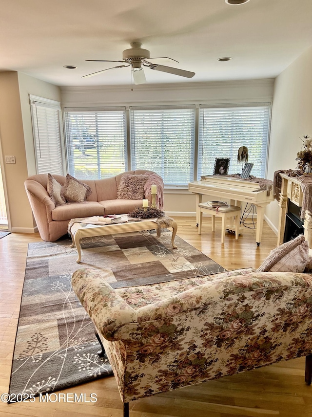 2 Apache Dr, Toms River, NJ 08753 - living area featuring light wood-style flooring, ceiling fan, and a healthy amount of sunlight