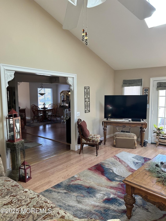 2 Apache Dr, Toms River, NJ 08753 - living room with high vaulted ceiling, wood finished floors, and a ceiling fan
