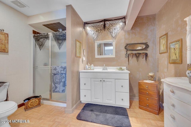 2 Apache Dr, Toms River, NJ 08753 - full bath with vanity, toilet, baseboards, a shower stall, and visible vents