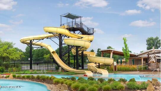 24 Albert St, Red Bank, NJ 07701 - view of playground featuring a community pool