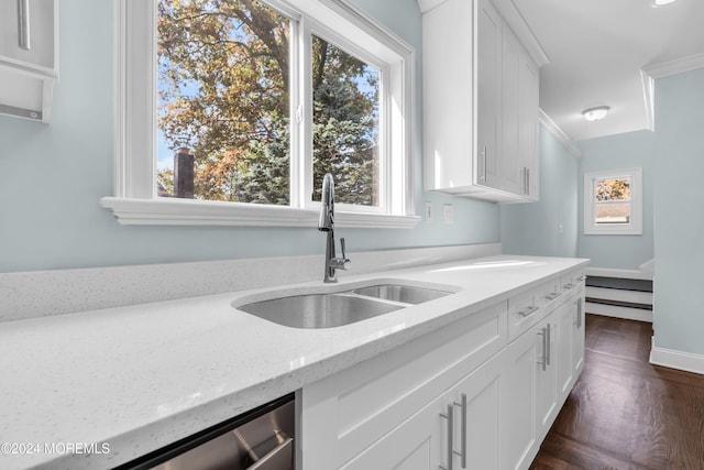 138 Summit Ave, Neptune City, NJ 07753 - kitchen featuring crown molding, light stone countertops, dark wood finished floors, a sink, and white cabinets