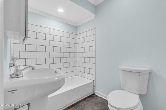 138 Summit Ave, Neptune City, NJ 07753 - bathroom featuring stone finish floor, a washtub, baseboards, toilet, and ornamental molding