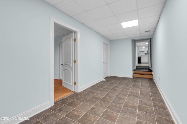 138 Summit Ave, Neptune City, NJ 07753 - interior space with baseboards and a drop ceiling