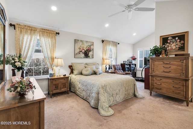 bedroom with lofted ceiling, multiple windows, recessed lighting, and light colored carpet