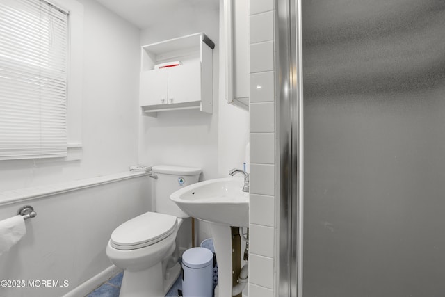 bathroom featuring toilet