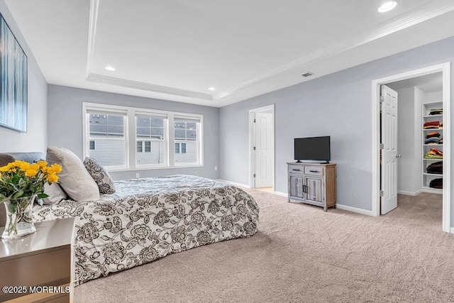 bedroom featuring recessed lighting, carpet floors, visible vents, baseboards, and a tray ceiling