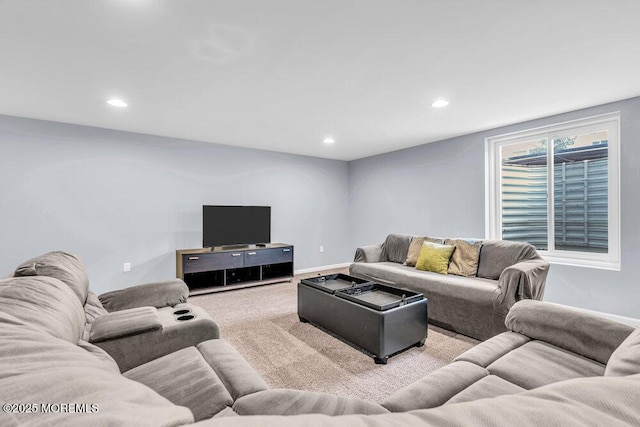 living room with baseboards, carpet flooring, and recessed lighting