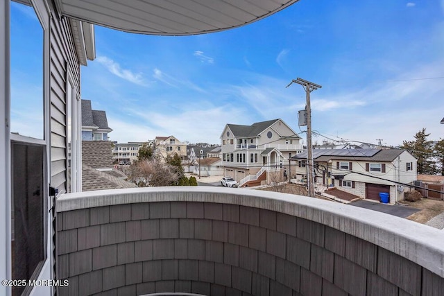 balcony featuring a residential view