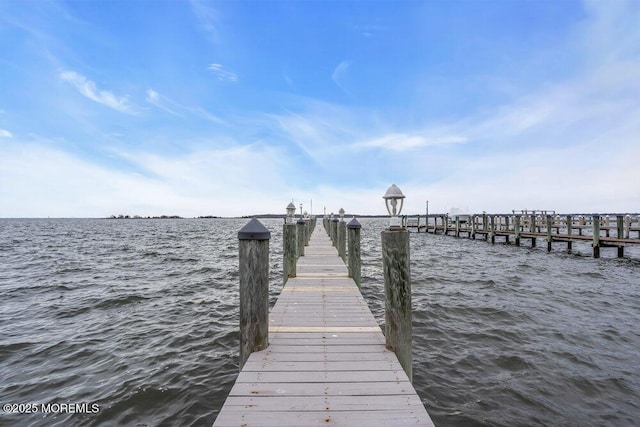 view of dock with a water view