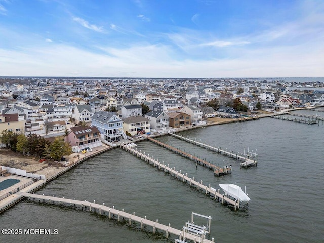 aerial view with a water view and a residential view