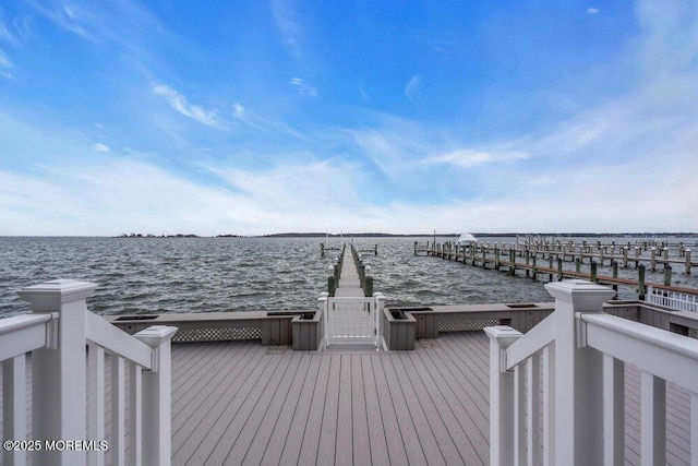 view of dock with a water view