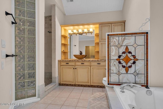 full bath featuring visible vents, tile patterned floors, a whirlpool tub, walk in shower, and vanity