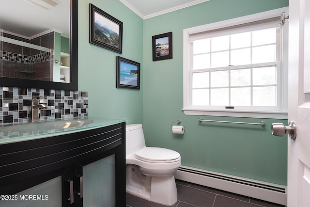 full bathroom featuring a baseboard radiator, decorative backsplash, toilet, ornamental molding, and vanity