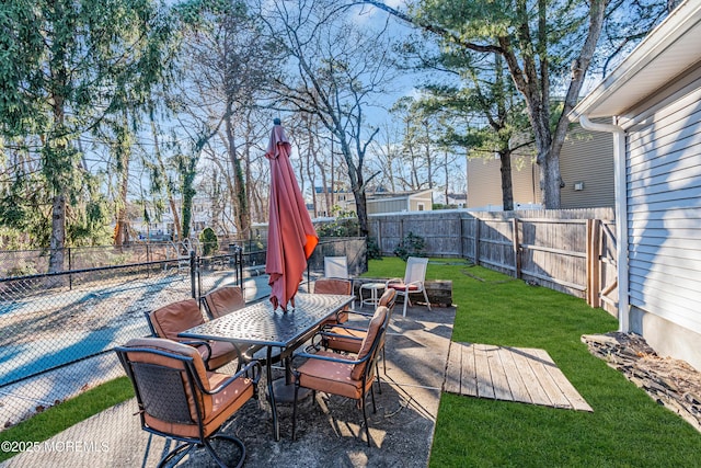 view of patio / terrace with outdoor dining area and a fenced backyard