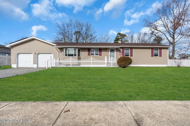 ranch-style house featuring aphalt driveway, an attached garage, a front yard, and a fenced front yard