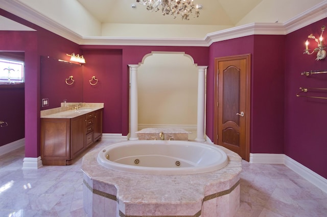 bathroom featuring vanity, baseboards, marble finish floor, a jetted tub, and ornate columns