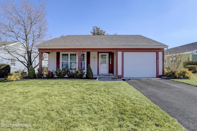 ranch-style home featuring a garage, driveway, a shingled roof, and a front lawn