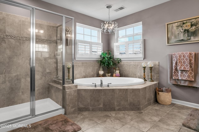 bathroom with a stall shower, visible vents, a notable chandelier, and a bath