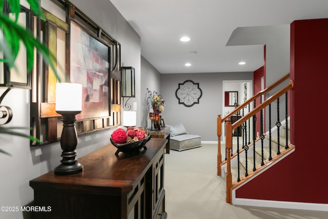 interior space featuring recessed lighting, carpet flooring, stairway, and baseboards